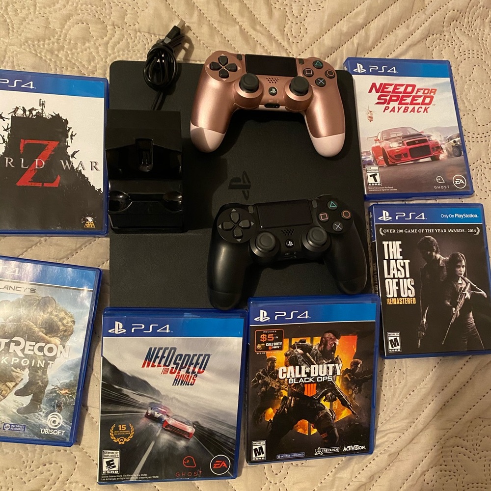 Ps4 bundle with 2 remotes and 6 games